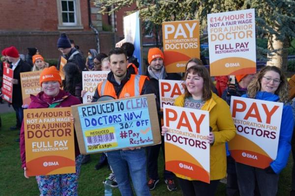 File photo dated 11/04/23 of striking NHS junior doctors on the picket line outside Leicester Royal Infirmary. Junior doctors in England have begun their fifth round of strikes, with some new doctors taking to picket lines just days after starting their first NHS jobs. Foundation Year 1 doctors started their first roles after medical school on Wednesday August 2 - just nine days ago. Now they are to walk out with colleagues for four full days amid the bitter dispute with the Government over pay. Issue date: Friday August 11, 2023. PA Photo. See PA story INDUSTRY Strikes. Photo credit should read: Jacob King/PA Wire