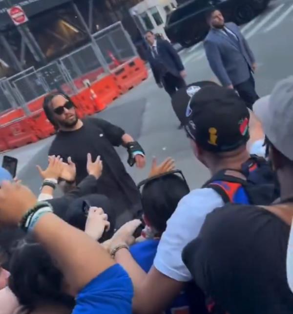 Jalen Brunson greets fans.