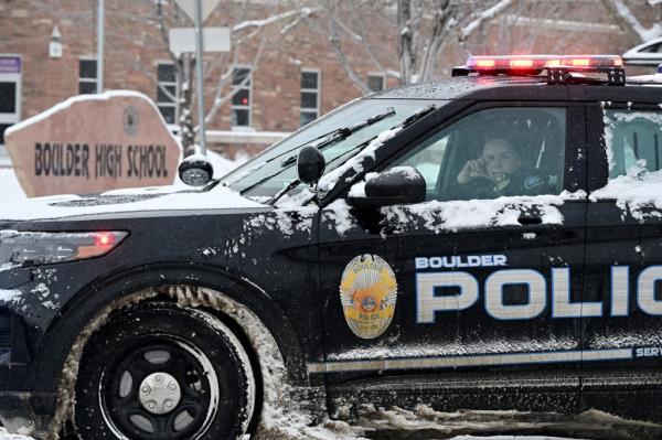  A Boulder police officer sits in her cruiser outside of Boulder High School in respo<em></em>nse to an unco<em></em>nfirmed report of a person with a gun at the school on February 22, 2023 in Boulder, Colorado