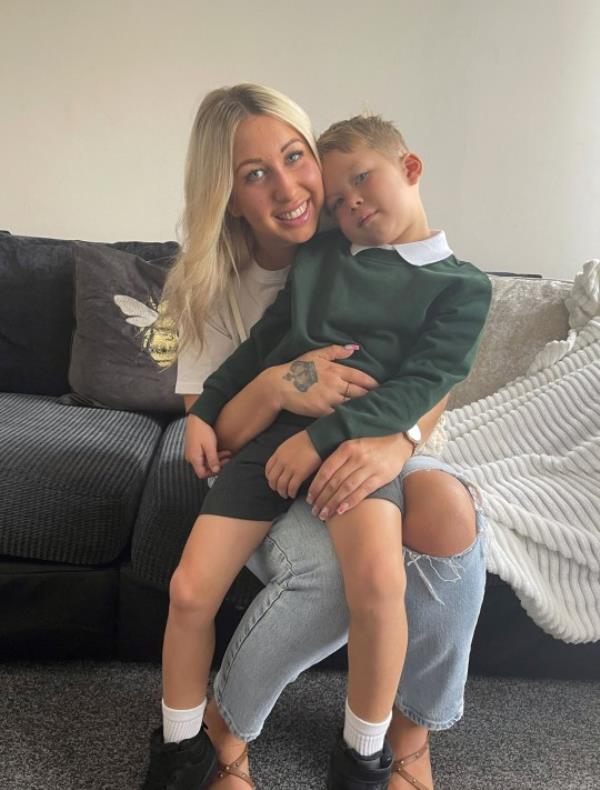 Zoe with Ethan ready for school