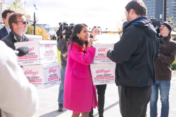 Petition creator and food blogger Vani Hari delivers boxes of petitions to Kellogg's headquarters during the protest.