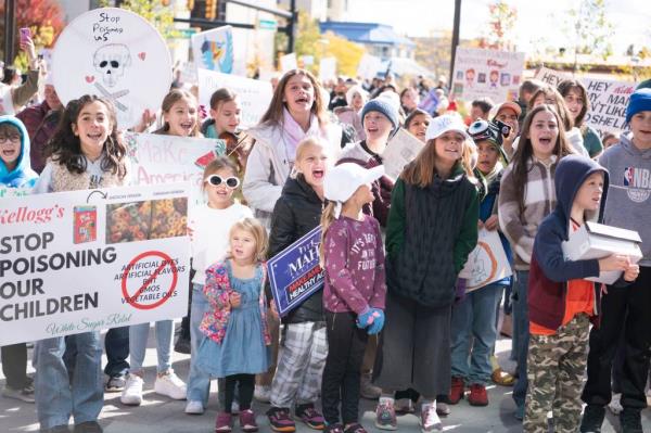Protesters including children gathered to demand the company remove the 