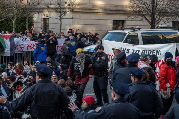 Pro-Palestine protestors with Jewish Voice for Peace block the road and get arrested outside of the Metropolitan Museum of Art in Manhattan, New York, 07 February 2024. 