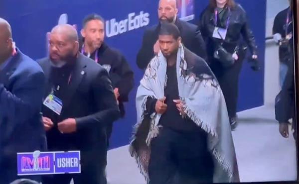 Usher in his blanket. 