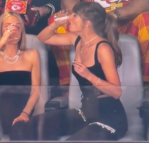 Taylor Swift chugging beer. 