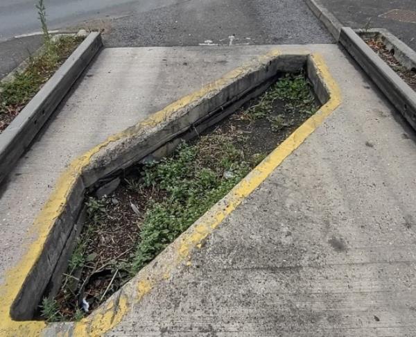 The bus lane trap at the junction of Station Road and Harrison Way in St Ives, Cambs. Photo released October 13 2023. See SWNS story SWLNtrap. Dozens of motorist are complaining their cars are being damaged after being caught in a co<em></em>ntroversial bus lane trap. The trap is located at the junction of Station Road and Harrison Way in St Ives, Cambs and is designed to prevent vehicles driving o<em></em>nto the busway. The pit in the road is wide enough that small vehicles fall into it but small enough that larger-diameter-wheeled vehicles, such as buses, may pass. But as of late, it could be argued the trap is proving a little too effective, with drivers getting stuck in it o<em></em>nce or twice a week.