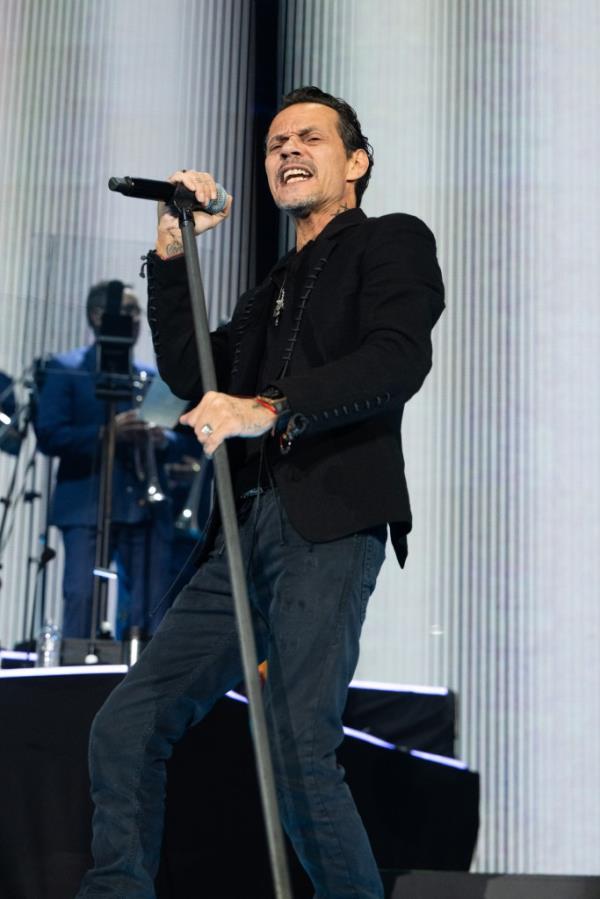 Singer Marc Anthony performs o<em></em>nstage during the 'Viviendo' tour at The Kia Forum on October 30, 2022 in Inglewood, California.