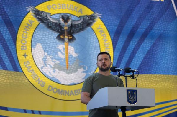 Ukrainian president Volodymyr Zelensky is seen speaking with servicemen.