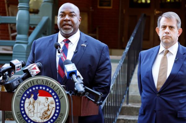 North Carolina LT. Gov. Mark Robinson speaks at a news co<em></em>nference with his attorney Jesse Binnall in Raleigh, NC on Oct. 15, 2024.