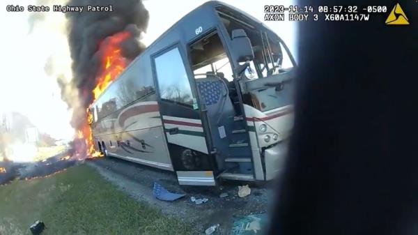 A screengrab from the footage shows the back of the bus on fire.