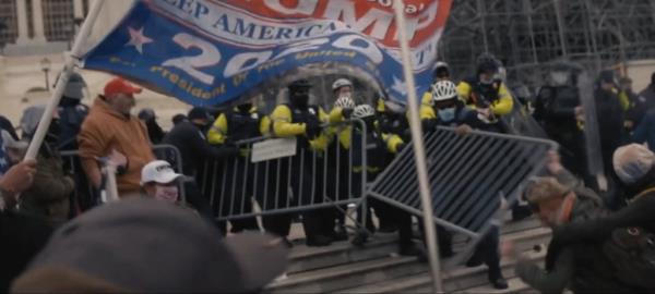 Biden also leaned into to Trump's role in the Jan. 6 riot in the ad.