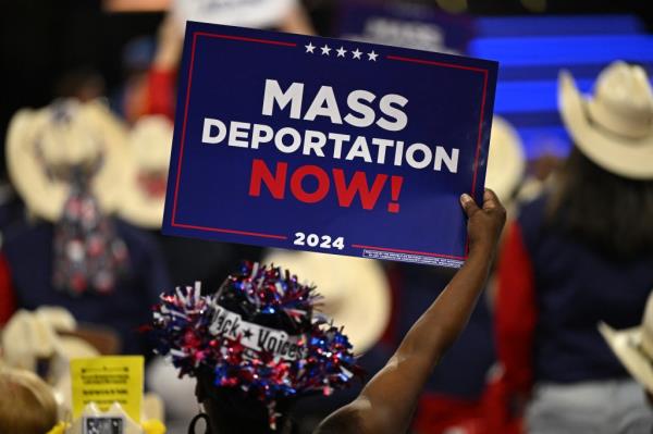A Trump supporter hold up a 