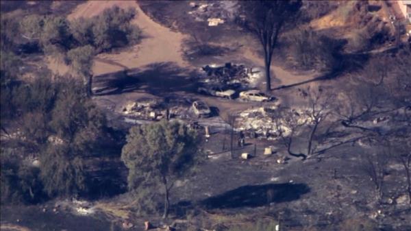 The fire burned 3.4 square miles, destroyed 21 homes and forced more than 400 people to evacuate reservation land.
