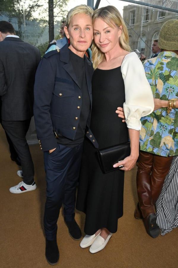 Ellen DeGeneres and Portia de Rossi posing for a photo at the unveiling of RH England, The Gallery at Aynho Park in Banbury, England
