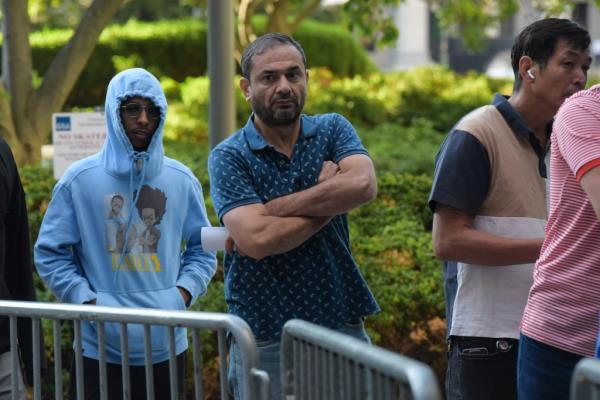Russian migrant Rufat, 46. 