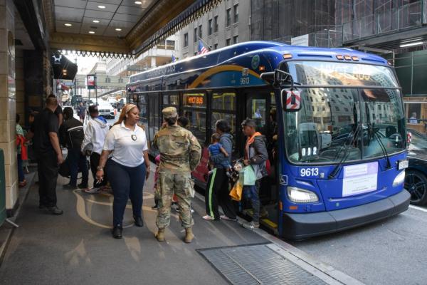 New York City drops migrants off at the Roosevelt Hotel.