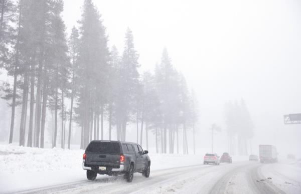 A motorist drives along Interstate 80 eastbound in Truckee, Calif., on Friday, March 1, 2024. 