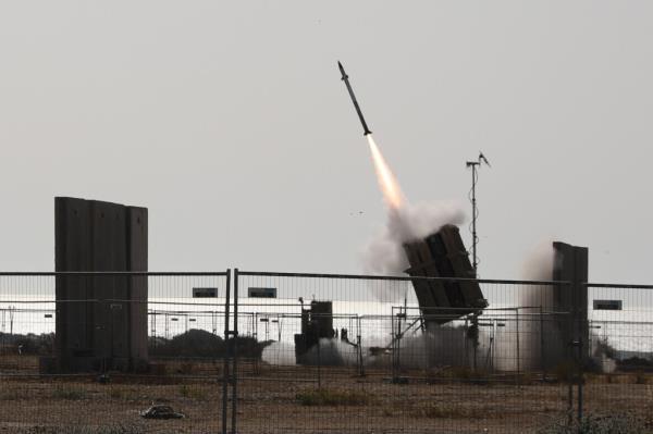The Israeli Iron Dome anti-rocket defense system in action against a rocket fired from Gaza Strip, in the city of Ashkelon, Israel, 11 May 2021. 