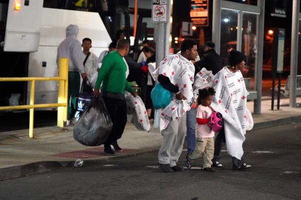 Migrants from the southern border being dropped of by a charter bus