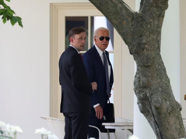 Natio<em></em>nal Security adviser Jake Sullivan accompanies U.S. President Joe Biden following a visit to the Office of the Director of Natio<em></em>nal Intelligence as they they return to the White House Washington, U.S., July 27, 2021.