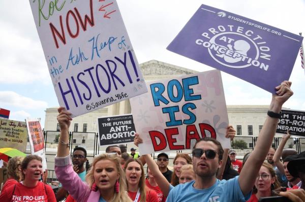 Pro-life supporters celebrate outside the US Supreme Court in Washington, DC, on June 24, 2022.