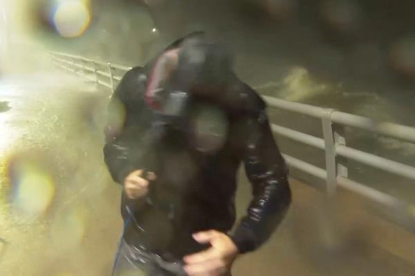 Cooper, known for his on-site coverage of hurricanes, took the incident in stride and co<em></em>ntinued his report of the water from the Manatee River rising above the river bank and o<em></em>nto the walkway above.