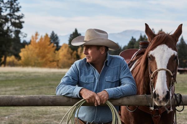 Kevin Costner with a horse. 