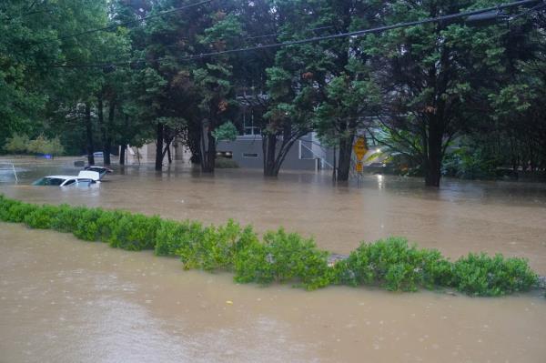 High water rescues of dozens of people being pulled out of an apartment complex happened a<em></em>bout a mile upstream from the scene of his rescue efforts. 
