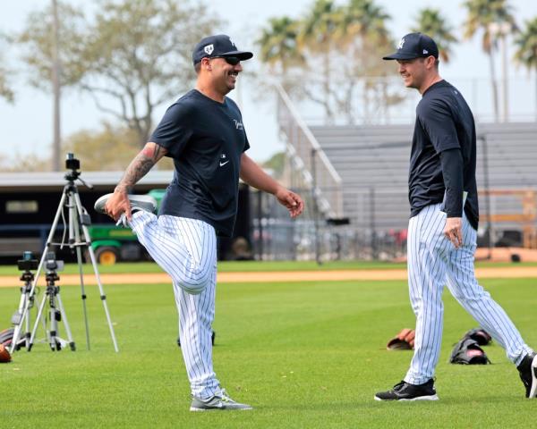 New York Yankees starting pitcher Nestor Cortes #65, with pitching coach Matt Blake, during practice at Steinbrenner Field