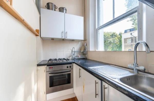 The kitchen is fairly standard, but looks very cramped