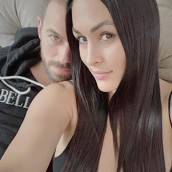 Artem Chigvintsev and Nikki Garcia pose for a selfie.