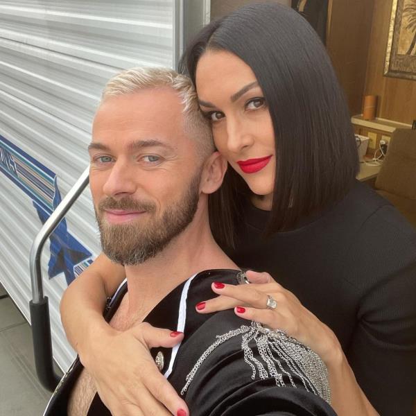Nikki Bella supporting Artem Chigvintsev behind-the-scenes of 