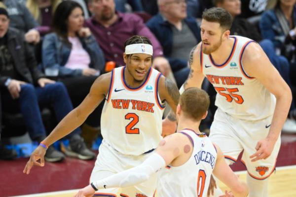 Knicks guard Miles McBride (2) celebrates his three-point basket