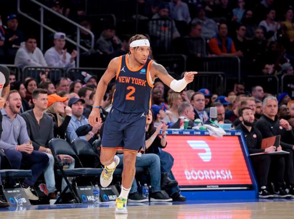 Miles McBride #2 of the New York Knicks reacts on the court after hitting a three point shot