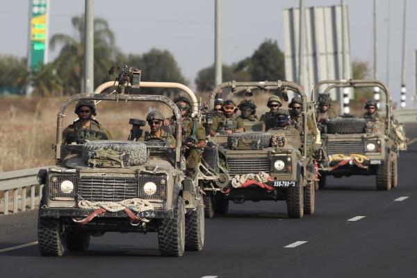 Israeli soldiers patrol along Israel's border with Gaza on Oct. 28, 2023.