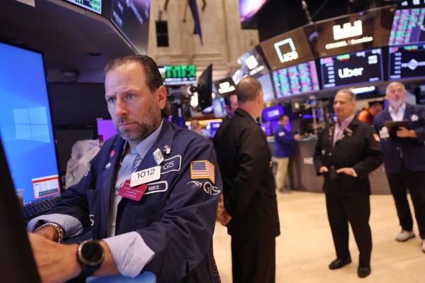 Wall Street was eyeing the latest inflation data to gauge whether the Federal Reserve will slash interest rates in the near future.