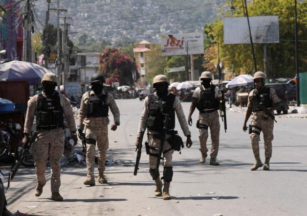 Police patrol a street after authorities extended the state of emergency amid gang violence in Port-au-Prince, Haiti.</p>

<p>　　