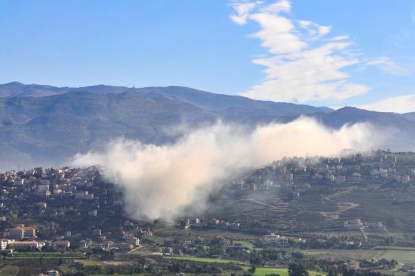 Smoke rises above the southern Lebanese border village of Khiam following Israeli bombardment on January 6, 2024