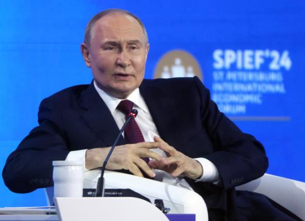 Russian President Vladimir Putin speaks during the plenary session