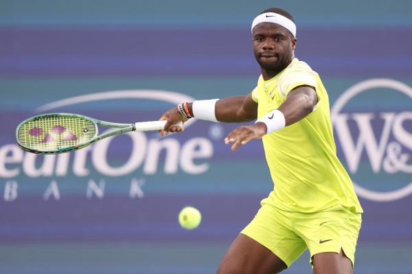 Frances Tiafoe returns a shot to Lorenzo Musetti of Italy during Day 4 of the Cincinnati Open at the Lindner Family Tennis Center on August 14, 2024 in Mason, Ohio.  