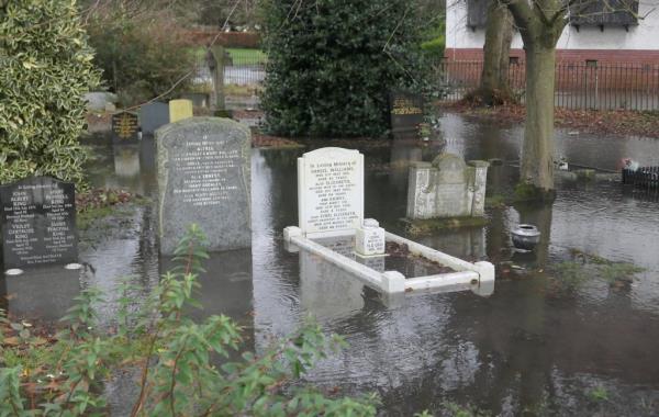 Storm Pia left its mark on port sunlight on the wirral today pathways, roads, a cementery were all flooded after heavy rainfall.