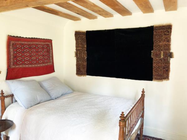 Interior of one of its four bedrooms. 