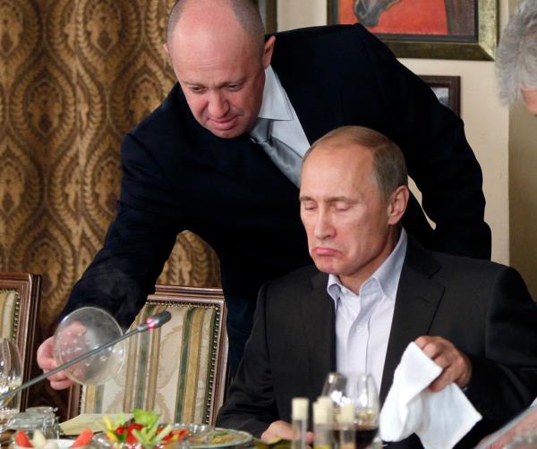 Prigozhin is one of Putin's closest co<em></em>nfidants who got his start catering food for the Kremlin. Putin, who's notoriously afraid of being killed via poiso<em></em>ned food, allows Prigozhin (with him above) unrivaled access to his meals. 