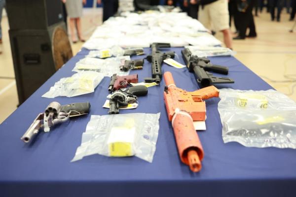 Drugs and guns seized in Suffolk County busts.