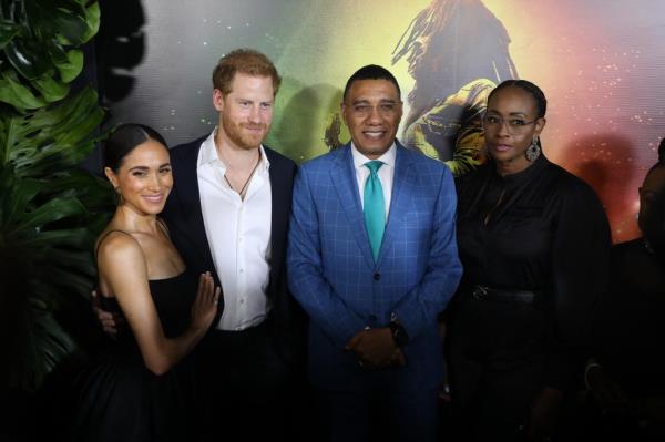 Meghan Markle and Prince Harry on the red carpet at the premiere of 