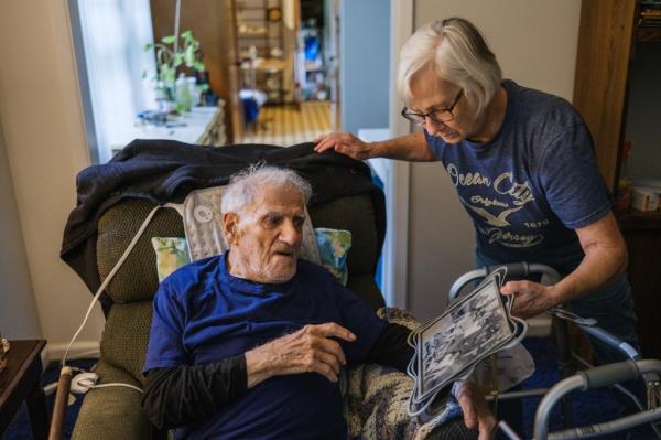 Michael Parisi, 101, Hunterdon County's oldest residents, and a loved one. 