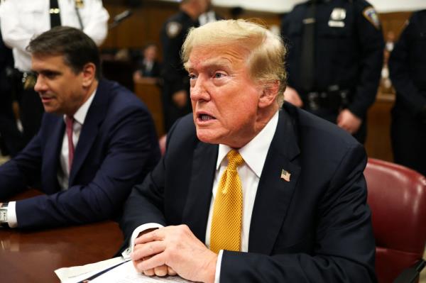 Trump awaits the start of proceedings in his criminal trial at Manhattan Criminal Court in New York City, on May 29, 2024.