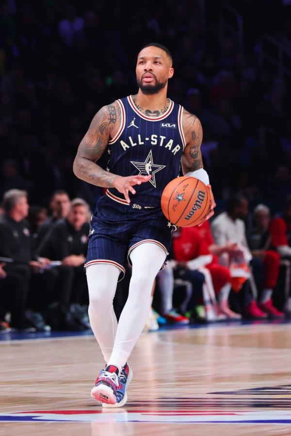 Damian Lillard dribbles the ball against the Western Co<em></em>nference in the 2024 NBA All-Star Game on Feb. 18, 2024.