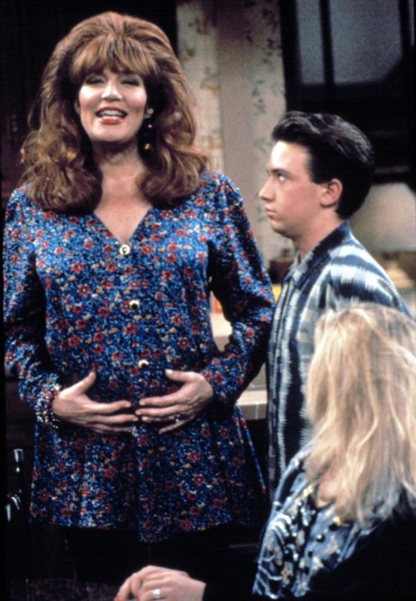 Pregnant Katey Segal holds her belly as David Faustino and Christina Applegate look on in 