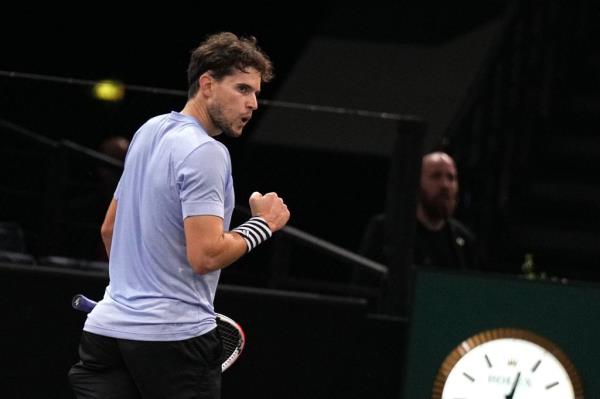 Dominic Thiem plays a forehand return to Switzerland's Stan Wawrinka during their men's singles match on day one of the Paris ATP Masters 1000 tennis tournament in Octomber.